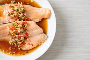 Poached Trout with Yuzu Ponzu Sauce. photo