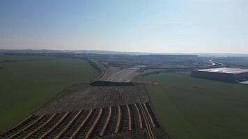 Aerial view of highway construction and field in Czechia in March 2025 II video