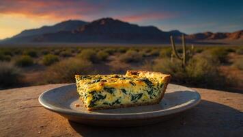 Spinach Quiche Slice on Plate with Desert Mountain Backdrop photo