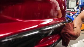 Car detailing using precise techniques to achieve a stunning glossy finish video