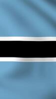 Vertical, portrait, waving national flag of Botswana. Smooth animation with highly detailed, realistic animated background for social media, screens smartphone. Official colors cloth motion video