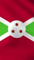 Vertical, portrait, waving national flag of Burundi. Smooth animation with highly detailed, realistic animated background for social media, screens smartphone. Official colors cloth motion video
