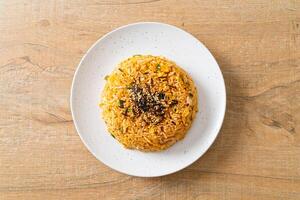 fried rice with egg in Korean style on white plate photo