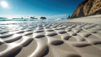 Beach Sand Patterns at Low Tide with Distant Cliffs and Waves photo