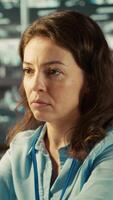 Vertical Close up of sad company manager checking revenue KPIs, stressed by low numbers. Portrait of tired management executive feeling dejected while reviewing project tasks data, camera B video