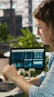 Vertical Employee at office desk getting upset after noticing mistake while editing documents, typing on keyboard. Overworked woman distraught by error committed while inputting data on laptop, camera A video