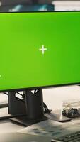 Vertical Green screen PC used by employee preparing for business meeting. Close up of mockup computer used by african american worker doing research analysis for startup organization, camera A video