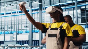Smart photovoltaics factory expert wearing VR headset looks at system performance metrics. Solar panels plant worker uses virtual reality tech to track energy production through IoT sensors, camera A video