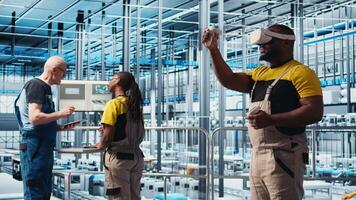 Engineer using virtual reality tech in industry 4.0 solar panels plant producing renewable energy. Technician in photovoltaics smart factory analyzing data using VR headset, camera A video