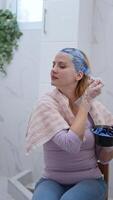Hair transformation journey with vibrant color application at home video
