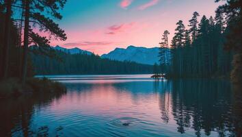 Lake at Sunset Reflecting Mountains and Forest with a Colorful Sky photo