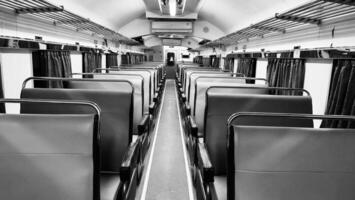 Train seats or train interior, empty passengers in train carriages, photo