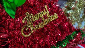Various decorative items like stars, bells, and glittering baubles that add charm to the Christmas tree. photo