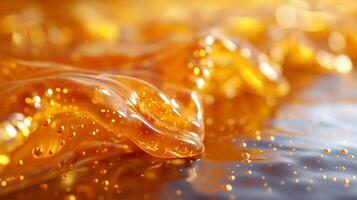 Close-up of golden amber gel with bubbles, creating a vibrant and fluid texture. photo