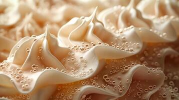 Close-up of creamy, textured swirls with bubbles, showcasing a smooth and inviting dessert element. photo