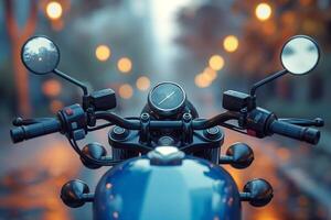 Close-up view of a motorcycle handlebar with reflections in the mirrors, enveloped in an atmospheric evening glow. photo