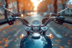 Close-up view of motorcycle handlebars with autumn leaves lining the street, creating a warm and inviting atmosphere. photo