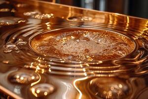A beautiful close-up of golden water ripples with bubbles, creating a serene and luxurious atmosphere. photo