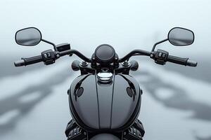 A sleek black motorcycle's handlebars set against a misty backdrop, embodying a sense of freedom and adventure. photo