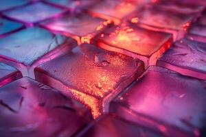 Vibrant abstract ice cubes illuminated in shades of pink and blue, creating a mesmerizing texture and glow. photo
