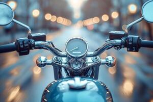 Close-up of motorcycle handlebars with a speedometer, reflecting city lights at dusk. photo