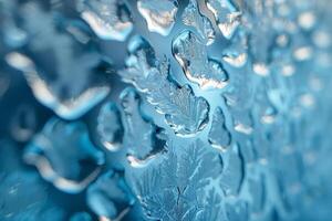 Close-up of intricate ice crystals on a blue background, creating a stunning frost pattern. photo