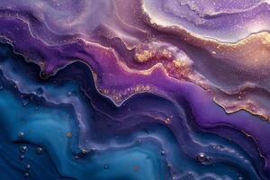 A stunning abstract composition featuring flowing waves of deep blues and vibrant purples with shimmering gold accents. photo