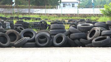Landfill with old tires and tyres for recycling. photo