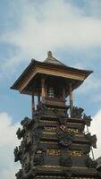 Traditional Balinese building architecture, Beautiful stone carvings in Balinese Hindu Temples photo