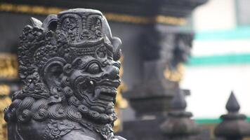 Balinese Hindu Temple, traditional Balinese building architecture with beautiful carved statues. photo