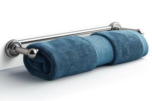 A rolled turquoise towel neatly hanging on a sleek silver towel bar, adding a touch of elegance to any bathroom decor. photo