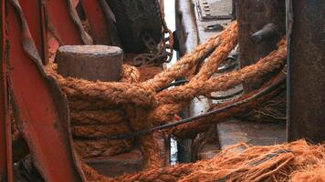 a very large ship's rope is used to tie up ships when they dock at the port, photo