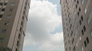 Abstract image of looking up at modern glass and concrete building. photo