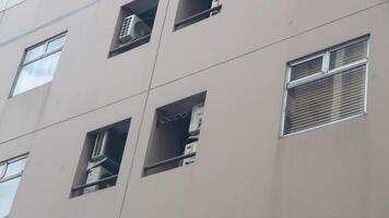 buildings, high-rise residential areas in the city. Abstract image of looking up at modern glass and concrete building. photo