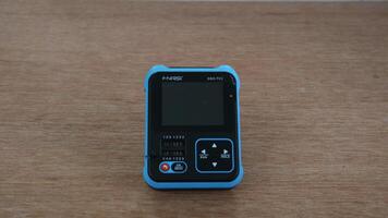 DSO-TC3 is a 3 in 1 digital oscilloscope, transistor tester, and transistor tester. photo