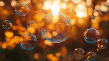 Translucent soap bubbles float against a glowing golden sunset, creating a magical atmosphere. photo
