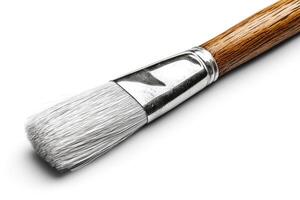 Close-up of a paintbrush with a wooden handle and soft bristles, perfect for artistic endeavors. photo