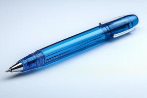 A clear, blue gel pen resting on a smooth surface, showcasing its sleek design and vibrant color. photo