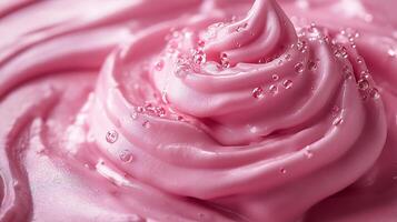 A close-up of creamy pink frosting adorned with tiny bubbles, creating a delicate and inviting texture. photo