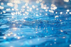 Glistening blue water surface with shimmering reflections, creating a tranquil and refreshing atmosphere. photo