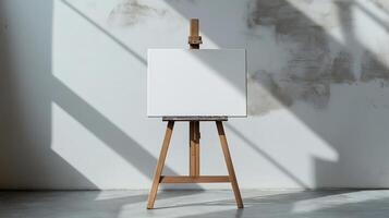 A blank canvas on a wooden easel in a sunlit studio, inviting creativity and inspiration. photo