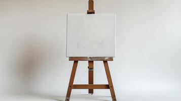 Empty canvas on wooden easel, inviting creativity and inspiration in a minimalistic setting. photo