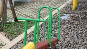 Usually made of wood or iron with a handle for safety. photo