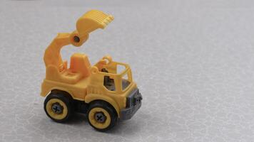 Big charger on a dark background. Industrial concept, using loaders photo