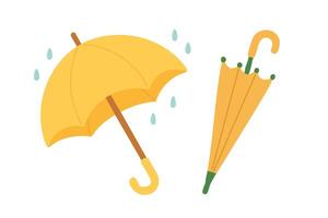 set of cute yellow umbrellas with raindrops in flat cartoon style on white background. vector