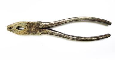 Vintage pliers, weathered and worn, symbolize resilience and enduring craftsmanship. Their rustic charm offers a tactile, nostalgic feel, perfect for projects evoking history, DIY, or repair. photo