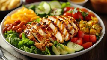 Fresh Cobb salad from USA with colorful vegetables tender chicken and zesty dressing styled in a dynamic high resolution gourmet presentation photo