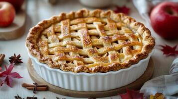Freshly baked apple pie from USA with a golden flaky crust and aromatic cinnamon filling presented in a cozy gourmet setting high resolution style photo