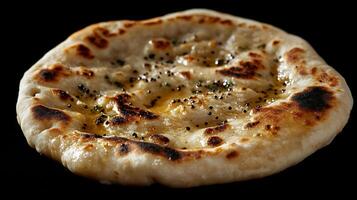 Freshly baked naan from India with a soft fluffy texture and aromatic hints of butter captured in a warm high resolution artisanal food photography style photo