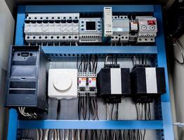 Voltage switchboard with circuit breakers. Modern electrical background. photo
